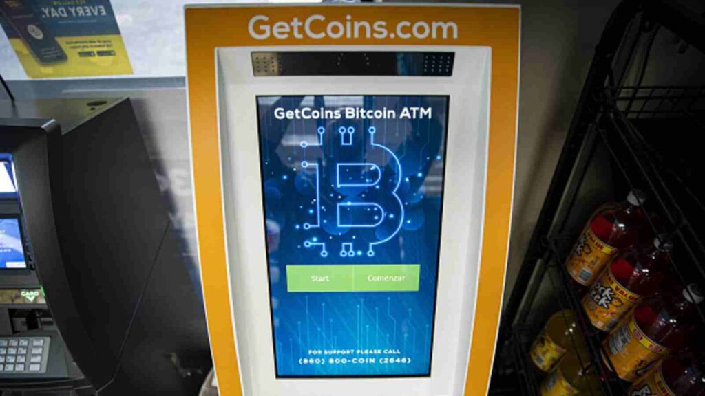 Bitcoin ATM machine inside a gas station as Minnesota lawmakers consider banning crypto kiosks over rising fraud cases targeting seniors.